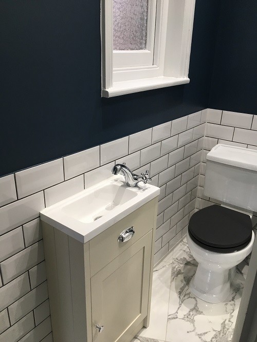Black and white metro tiles toilet